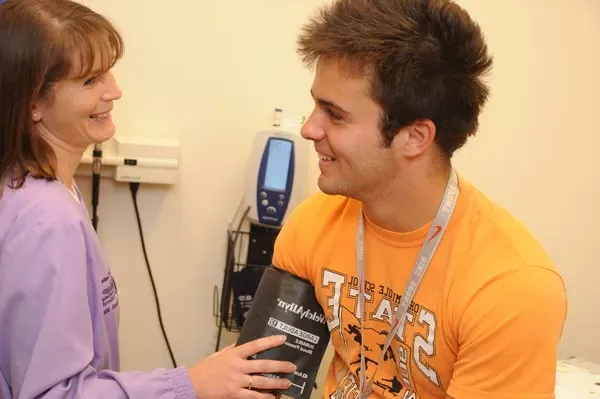 Student getting a checkup at the health center